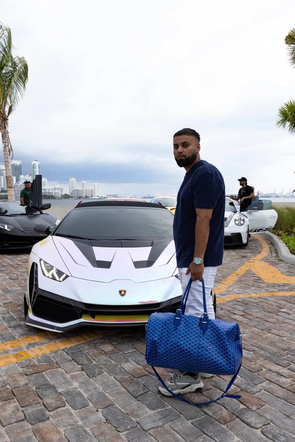 Zain Sajid standing beside his Tornasol Lamborghini Huracán.